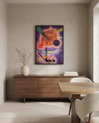 Three Elements by Wassily Kandinsky in a black frame above a walnut sideboard in a dining room