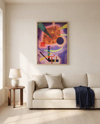 Three Elements by Wassily Kandinsky framed in natural oak above a cream sofa in a warm living room