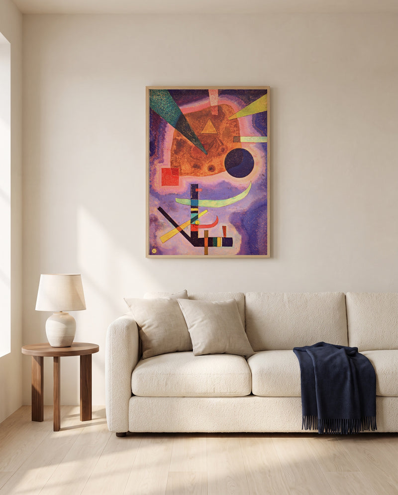 Three Elements by Wassily Kandinsky framed in natural oak above a cream sofa in a warm living room