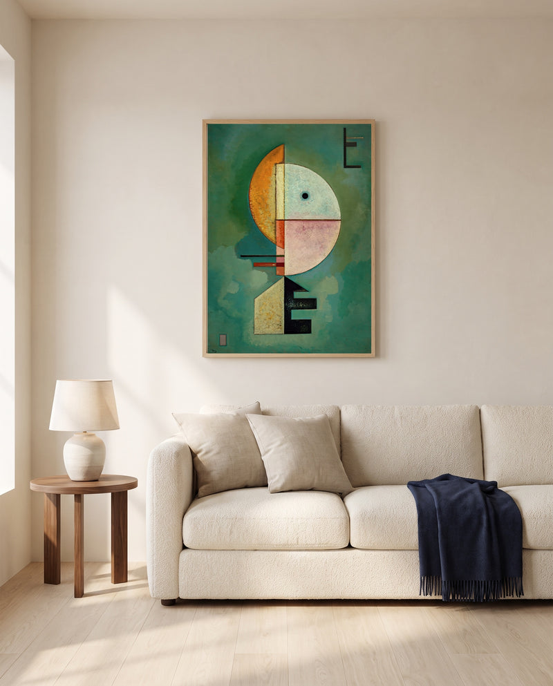 Upward by Wassily Kandinsky framed in natural oak above a cream sofa in a warm living room