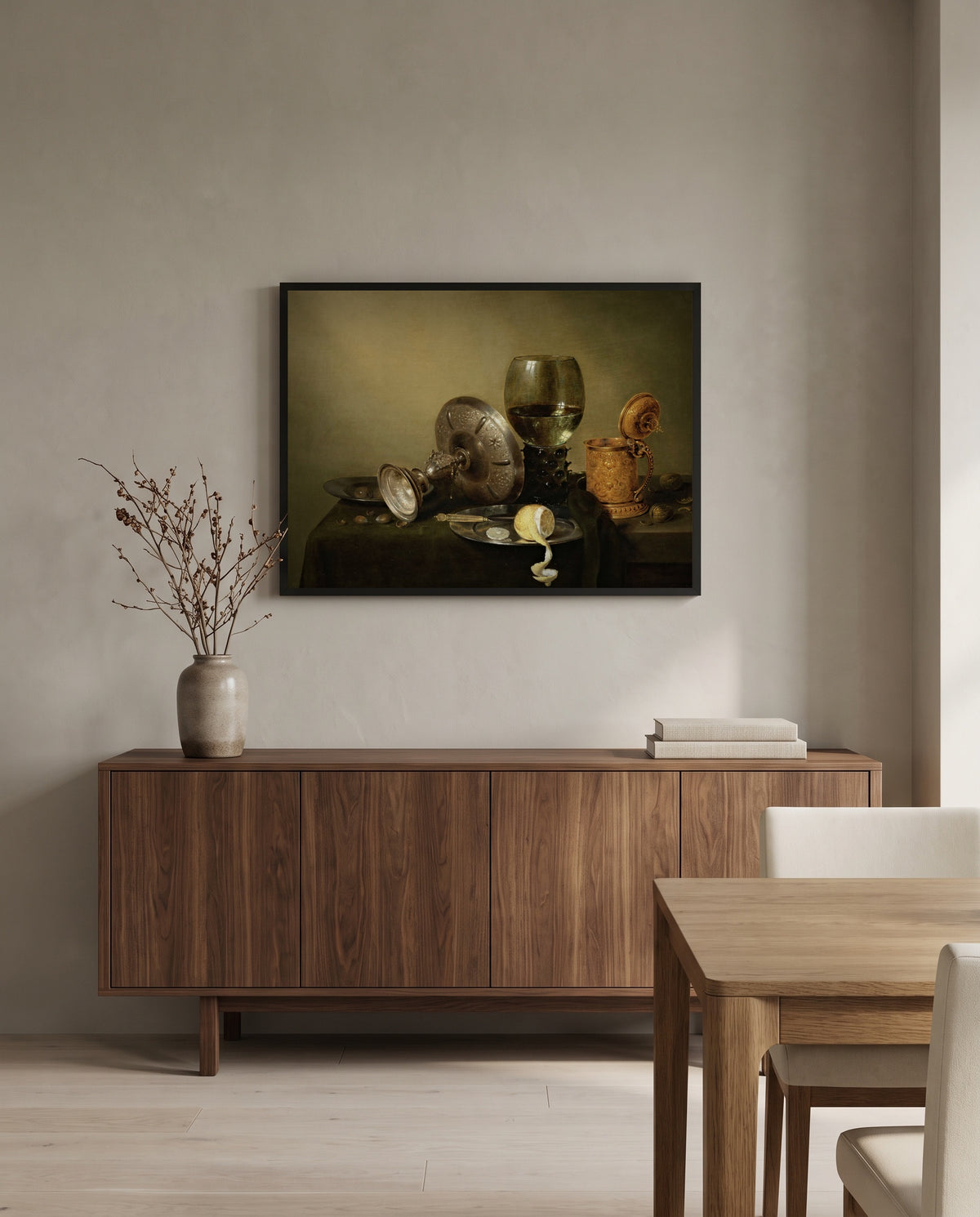 Gilded Beer Tankard by Willem Claesz. Heda in a black frame above a walnut sideboard in a dining room