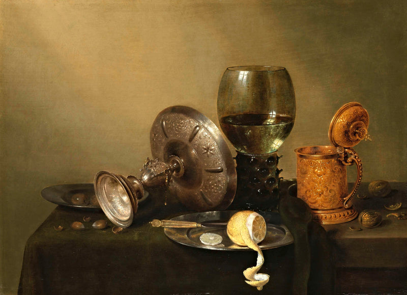 Still Life with a Gilded Beer Tankard by Heda: a toppled silver cup, a tall green glass, a peeled lemon and a gold tankard
