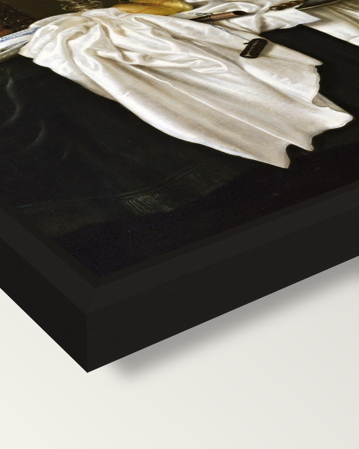 Still Life with a Lobster by Heda framed canvas, corner close-up: a black floating frame with a shadow gap round the canvas