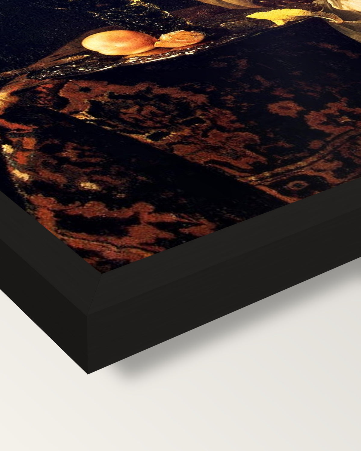 Dessert by Willem Kalf framed print, corner close-up: black moulding, mitred, the print set just below its edge