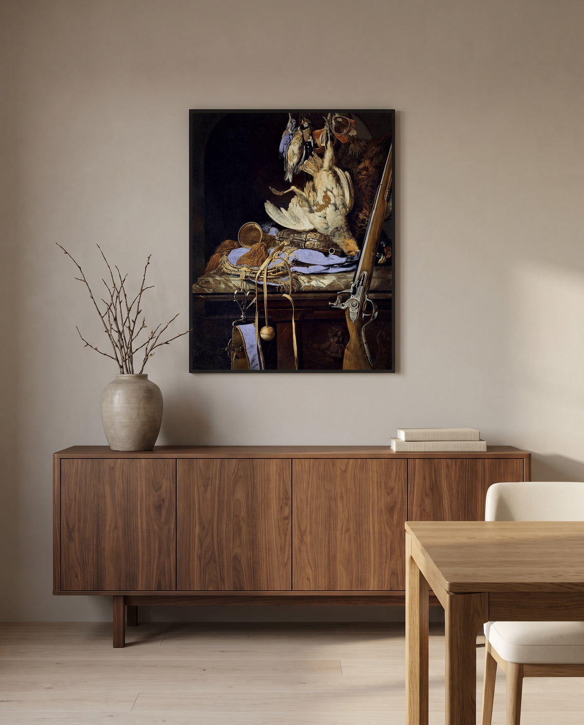 Dead Birds and Hunting Gear by Willem van Aelst in a black frame above a walnut sideboard in a dining room