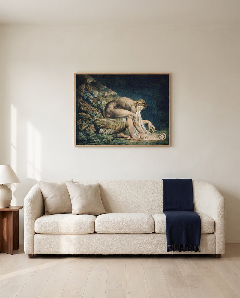 Newton by William Blake framed in natural oak above a cream sofa in a warm living room