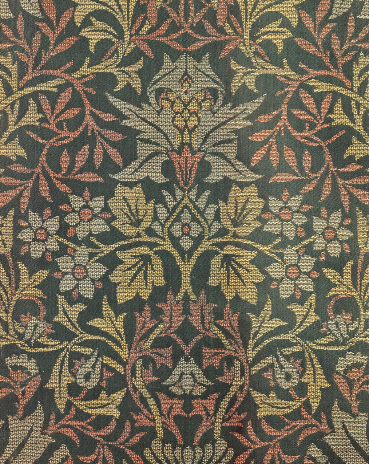 Flower Garden by William Morris: flowers and leaves woven in rose, pale blue and gold on a deep green silk ground