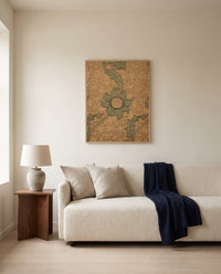 Kennet by William Morris framed in natural oak above a cream sofa in a warm living room