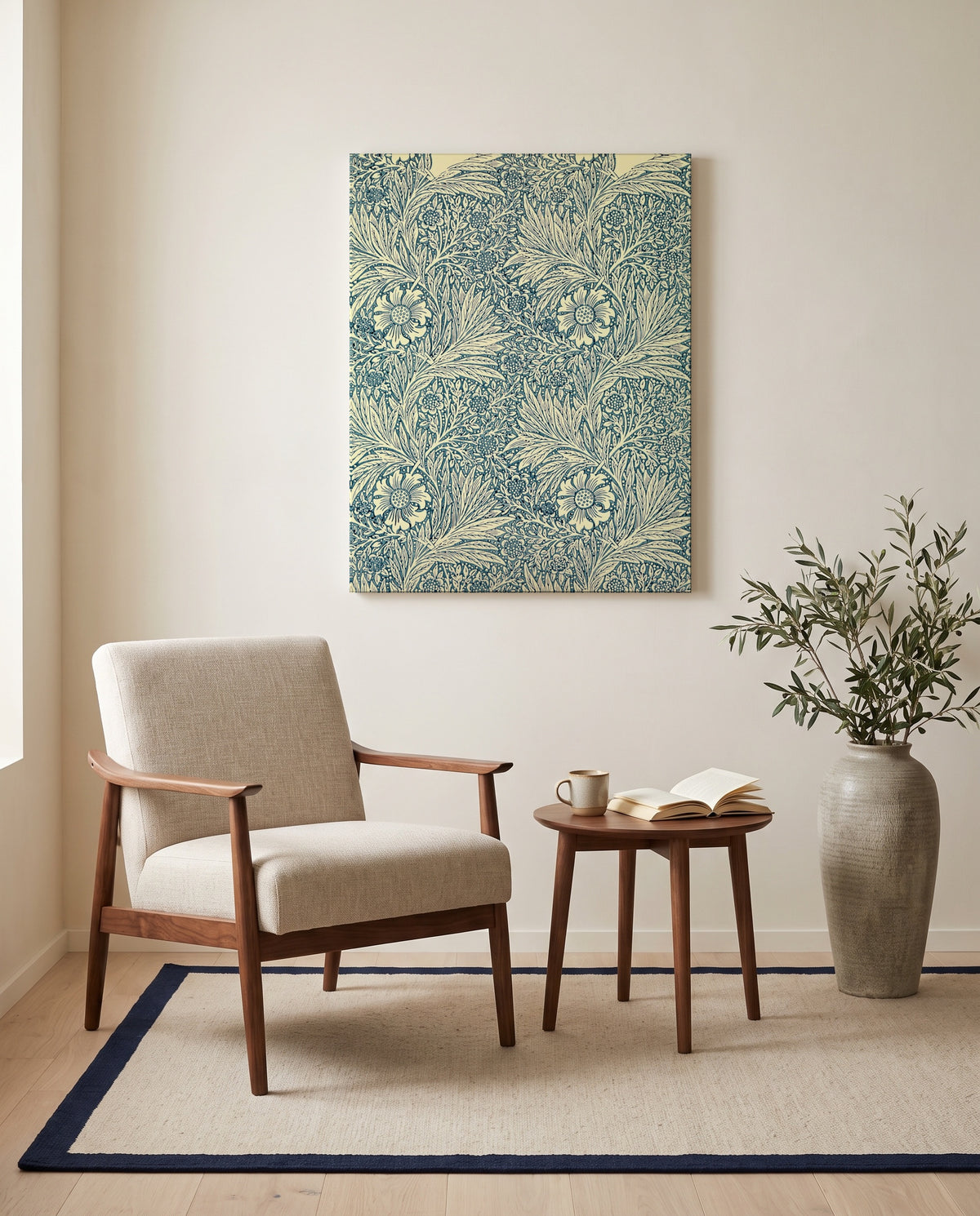 Marigold by William Morris as a stretched canvas above a linen lounge chair in a reading corner