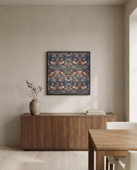 Strawberry Thief by William Morris in a black frame above a walnut sideboard in a dining room