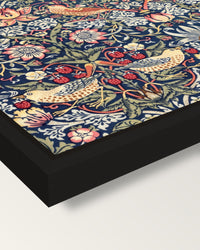 Strawberry Thief by William Morris framed canvas, corner close-up: a black floating frame with a shadow gap round the canvas