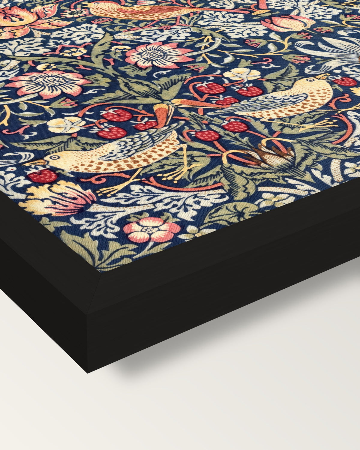 Strawberry Thief by William Morris framed print, corner close-up: black moulding, mitred, the print set just below its edge