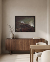 Coast of Maine by Winslow Homer in a black frame above a walnut sideboard in a dining room
