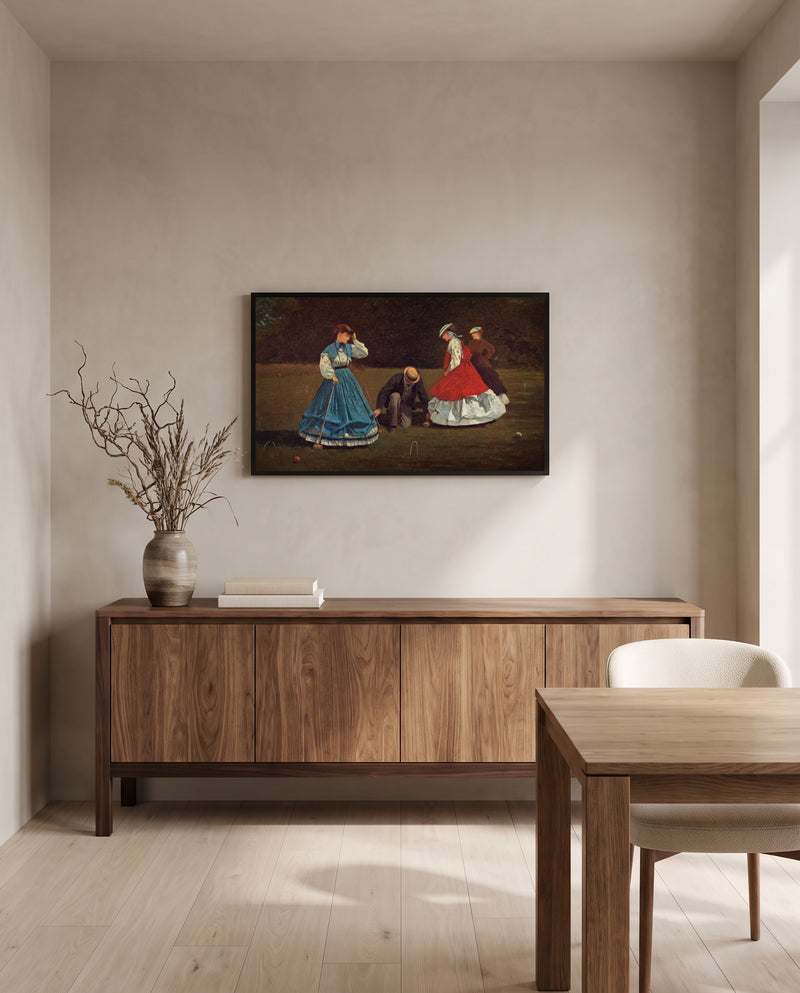 Croquet Scene by Winslow Homer in a black frame above a walnut sideboard in a dining room