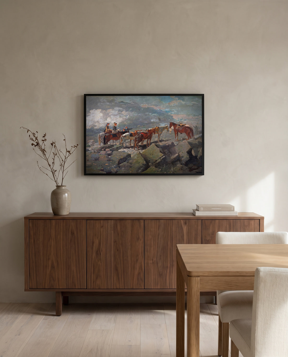 Mount Washington by Winslow Homer in a black frame above a walnut sideboard in a dining room