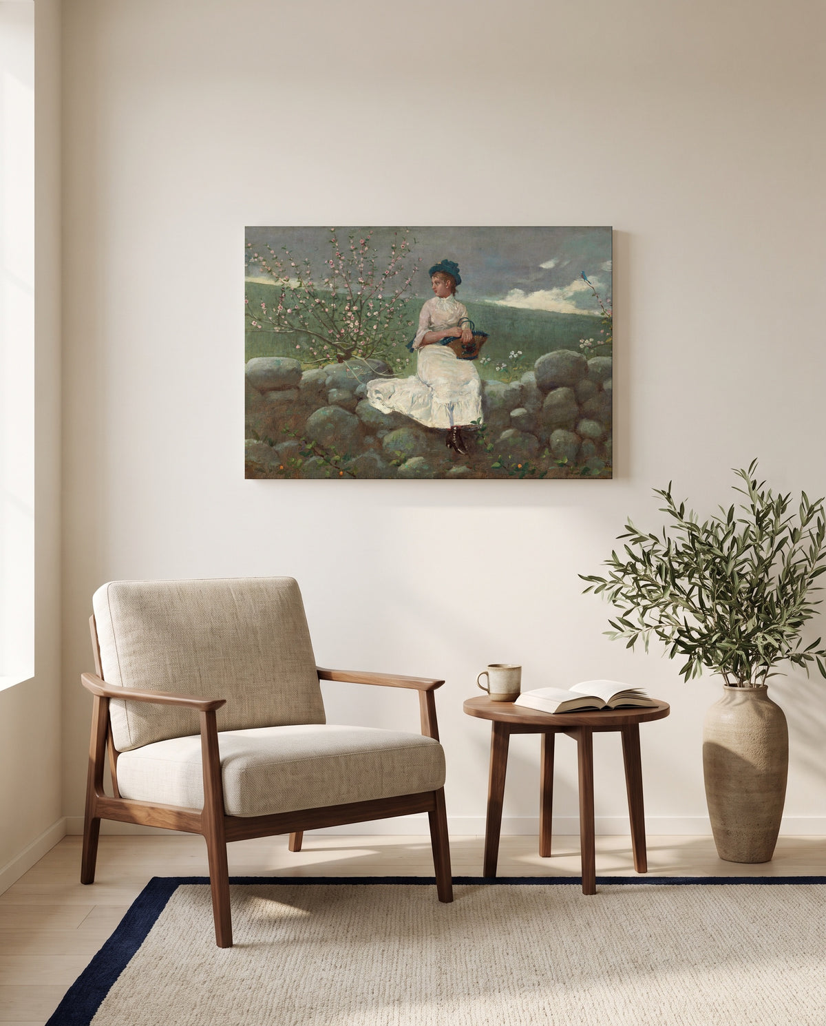 Peach Blossoms by Winslow Homer as a stretched canvas above a linen lounge chair in a reading corner