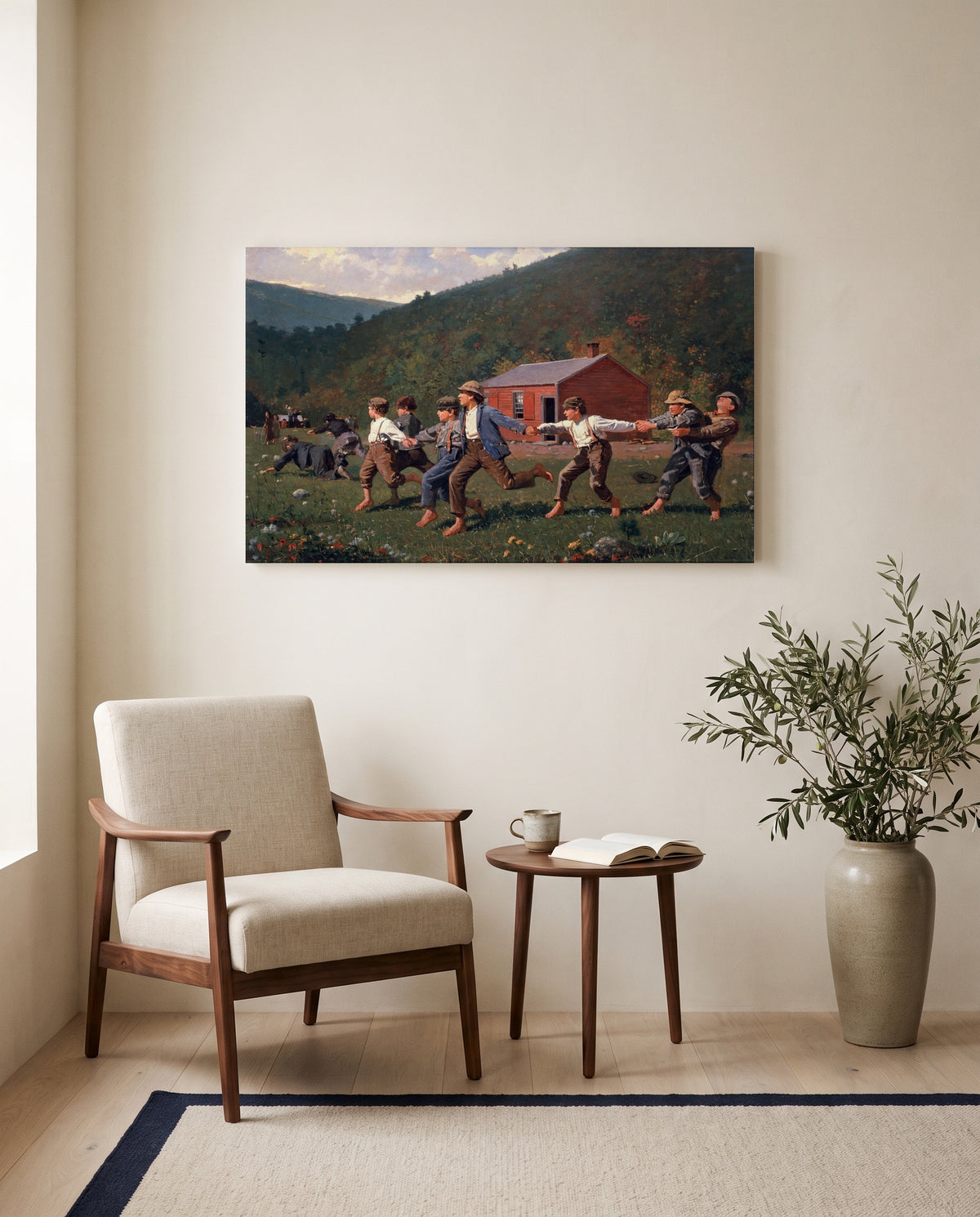 Snap the Whip by Winslow Homer as a stretched canvas above a linen lounge chair in a reading corner