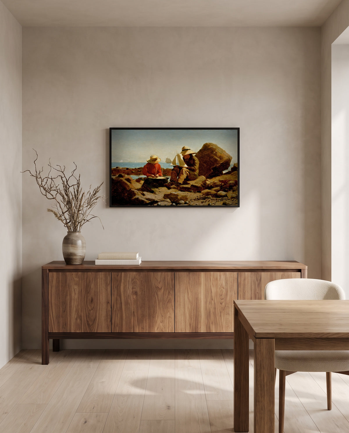 The Boat Builders by Winslow Homer in a black frame above a walnut sideboard in a dining room