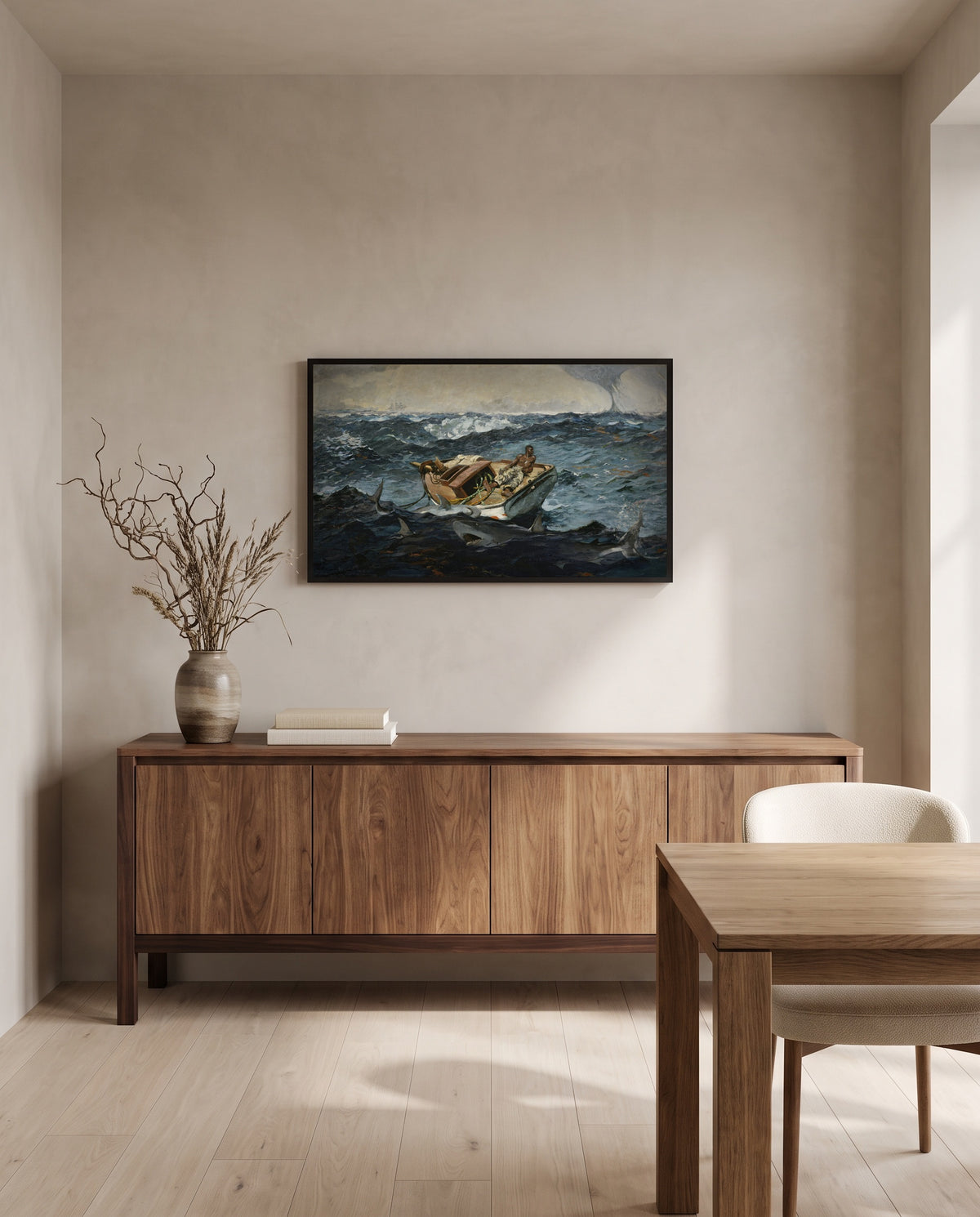 The Gulf Stream by Winslow Homer in a black frame above a walnut sideboard in a dining room