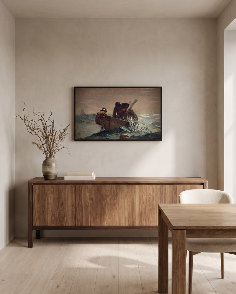 The Herring Net by Winslow Homer in a black frame above a walnut sideboard in a dining room