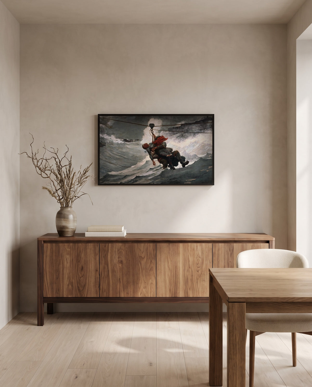 The Life Line by Winslow Homer in a black frame in a dining room
