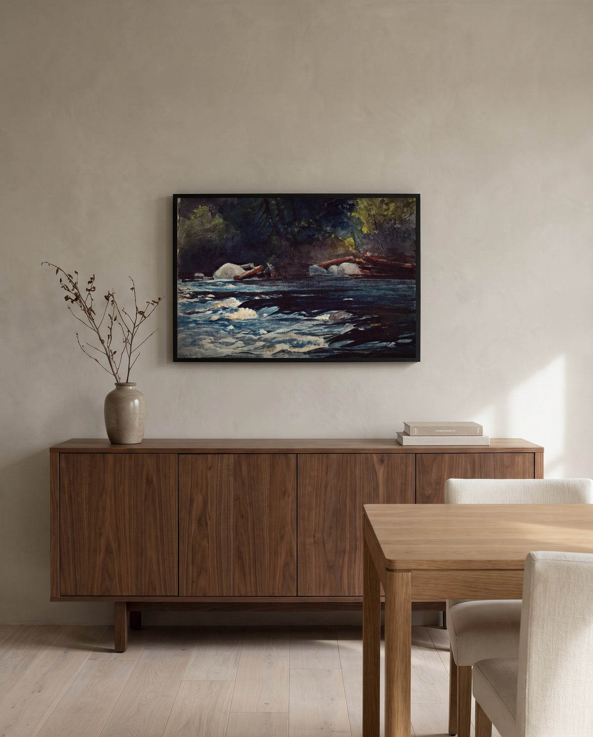 The Rapids, Hudson River by Winslow Homer in a black frame above a walnut sideboard in a dining room