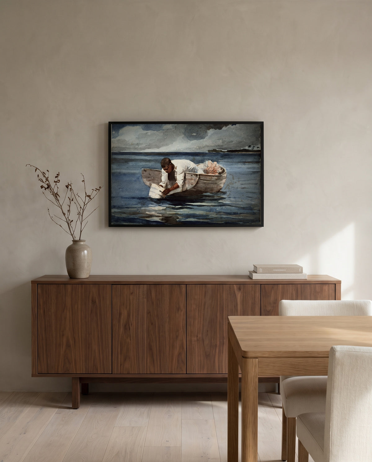 The Water Fan by Winslow Homer in a black frame above a walnut sideboard in a dining room